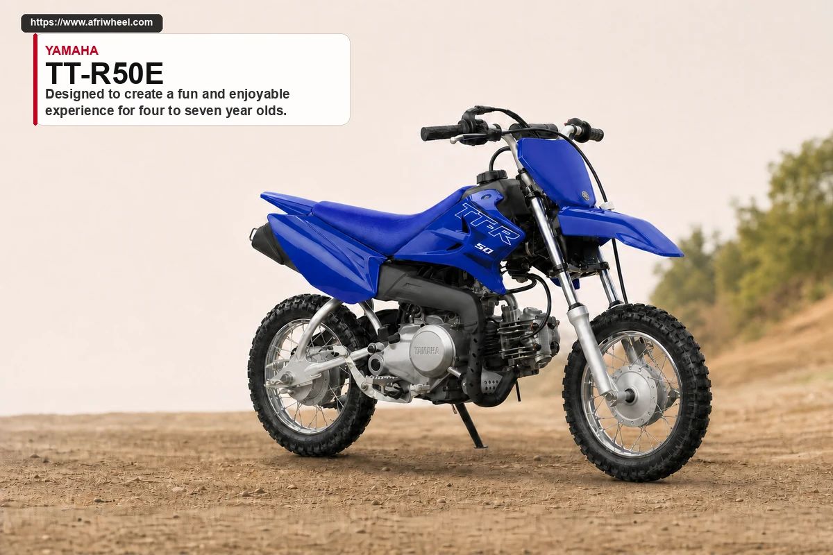 Yamaha TT-R50E in Team Yamaha Blue, front three-quarter hero view on an off-road surface